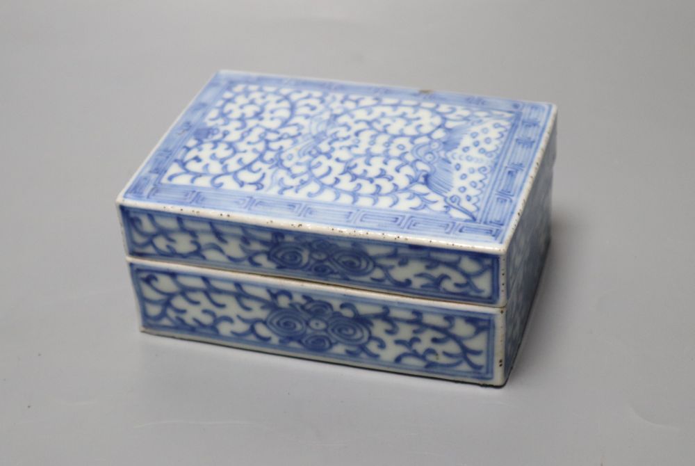 A pair of Chinese famille rose bowls and covers, late 19th century, a blue and white box and cover, 11cm and an eggshell bowl, 8cm